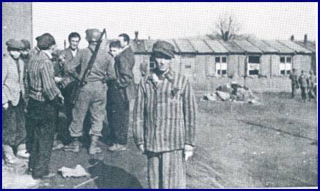 Prisoners in the Ahlem concentration camp welcome the sight of an American soldier on April 10, 1945